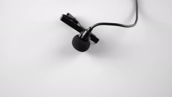 Lapel Microphone on Rotation Table Audio and Sound Recordering Concept