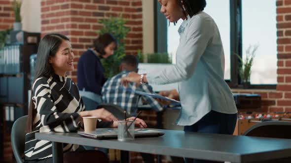 Female Candidate Greeting HR Recruiter at Job Interview