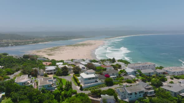 Elevated View of Sea Coast Waves Rolling to Sand Beach