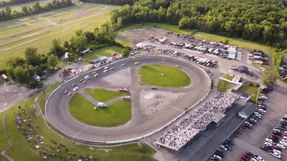 Aerial View Of Stock Car Racing Competition At Flat Rock Speedway In Monroe County, Michigan, USA.