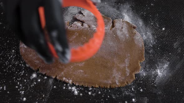 The Cookie Dough Is Rolled with a Rolling Pin. The Chef Uses the Form To Make Cookies. Everything Is