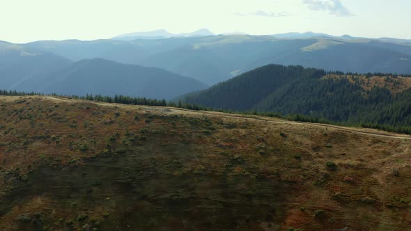 Aerial Beautiful Hills Road Way for Travellers Stunning Rocky Mountains Panorama