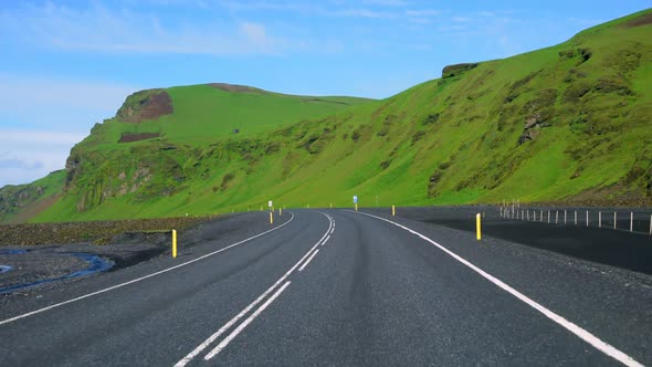 FPV of Car Driver POV Driving Along Countryside Road of Southern Iceland