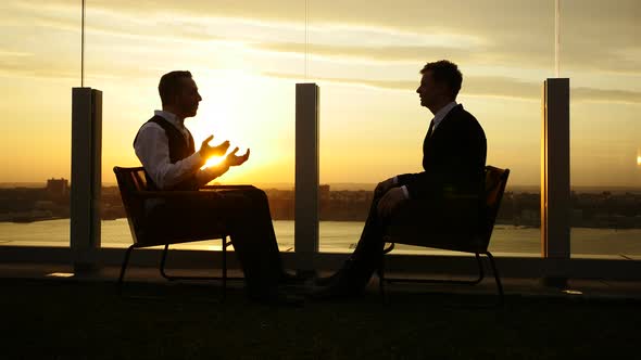 Two Male Entrepreneurs Meeting Together Talking About Business Ideas