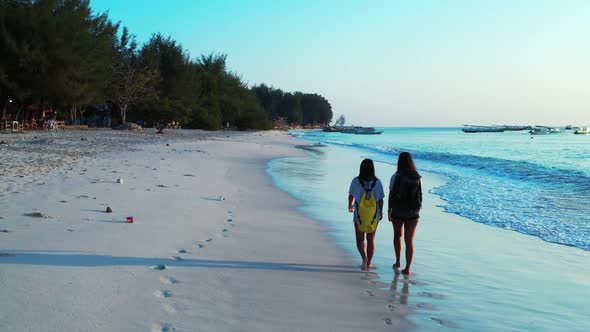 Beautiful women tan on exotic bay beach holiday by transparent water and white sandy background of G