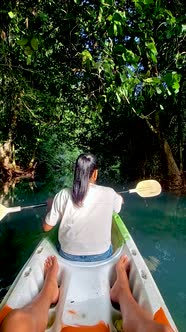 Couple in Kayak in the Jungle of Krabi Thailand Men and Woman in Kayak at a Tropical Jungle in Krabi