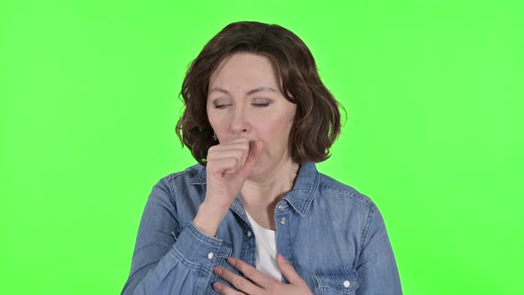 Sick Old Woman Coughing on Green Chroma Key Background