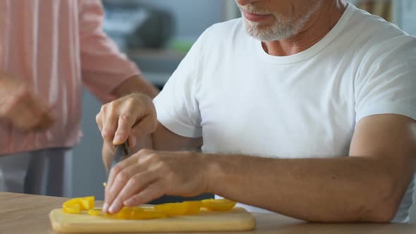 Husband Preparing Salad for Wife, Vegetarian Family Recommends Healthy Lifestyle