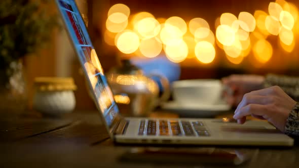 Shopping Online Concept. Woman Making Payment with Credit Card and Laptop. Winter Christmas