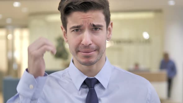 Angry Businessman Yelling in Office