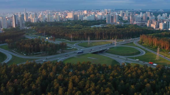 Aerial View of a Busy Motorway Interchange with a Lot of Traffic