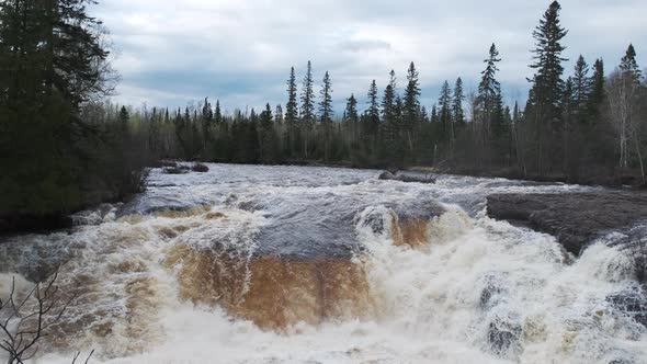 Raging Northwoods river from spring snowmelt