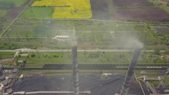 Chimneys of a Thermal Power Plant. Shooting From the Height of an Energy Object Running on Fossil