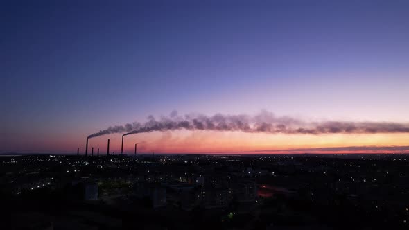 An Epic Sunset with a View of the Smoking Factory