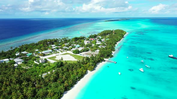 Beautiful flying abstract view of a summer white paradise sand beach and aqua blue water background 