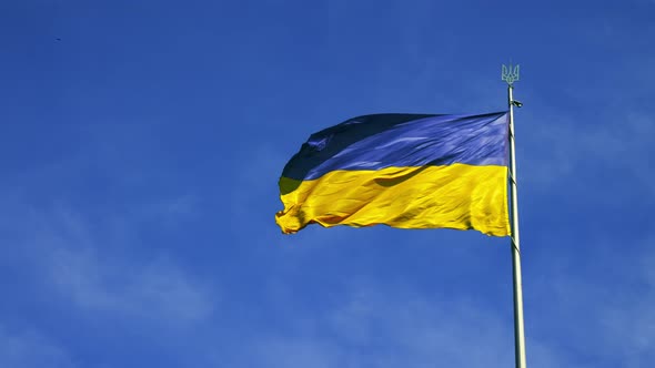 Ukraine Flag Waving in the Wind in Kyiv