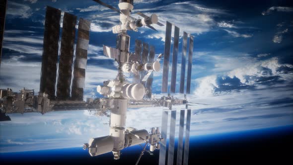 A View of the Earth and a Spaceship. ISS Is Orbiting the Earth alt