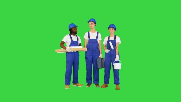 Group Of Construction Workers Standing and Smiling on a Green Screen Chroma Key