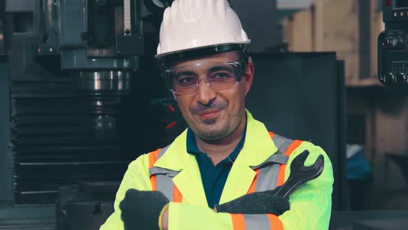 Young Factory Worker or Engineer Close Up Portrait in Factory