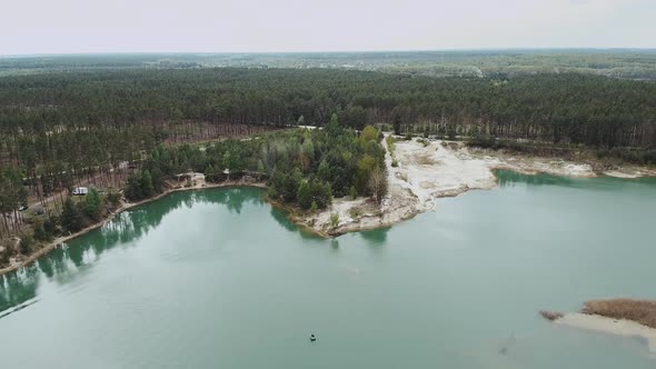 Aerial View of Lake Pine Forest on the Background