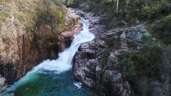 Crystal clear waters of Portela do Homem waterfall, Geres National Park, Portugal