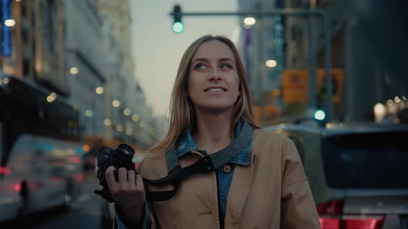 Young Travel Blogger Woman on Busy City Street