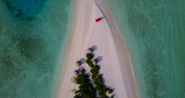 Luxury fly over clean view of a summer white paradise sand beach and aqua turquoise water background