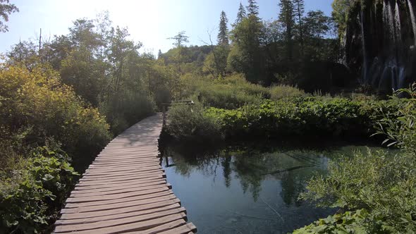 Walking near Veliki Prstavac waterfall  in Plitvice National Park, Croatia