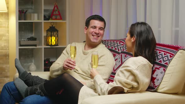 Zoom in Shot of Couple Holding Glasses of Champagne