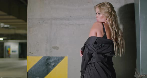 Portrait Shot of a Happy Beautiful Ukrainian Woman in an Underground Car Park