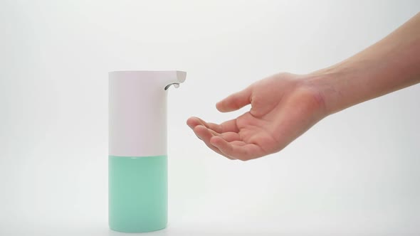 Closeup Women's Hands Automatic Dispenser Disinfector Isolated Background Closeup