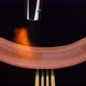 Cooking sausage using gas burner torch. Grilling sausages on black background - VideoHive Item for Sale