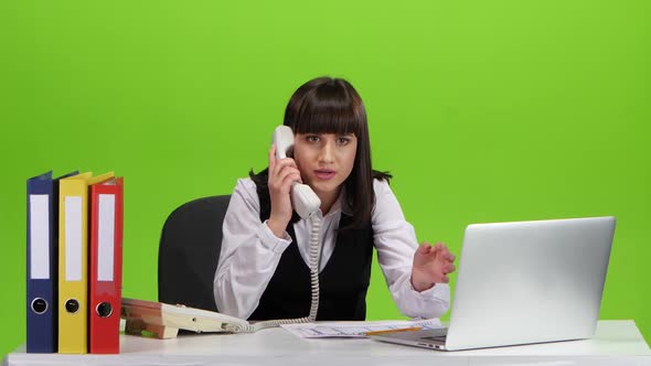 Angry Phone Conversation Between the Girl and Her Subordinate. Studio