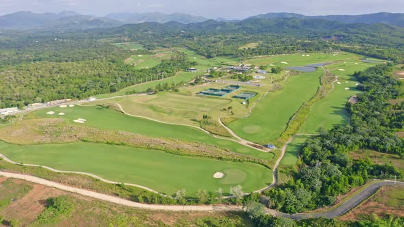 Aerial panoramic shot of Vista Golf and Country Club surrounded by scenic landscape of Dominican Rep