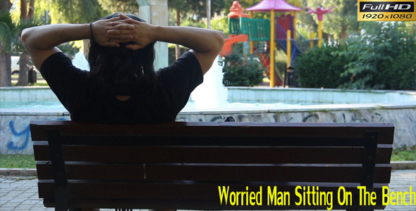 Worried Man Sitting On The Bench