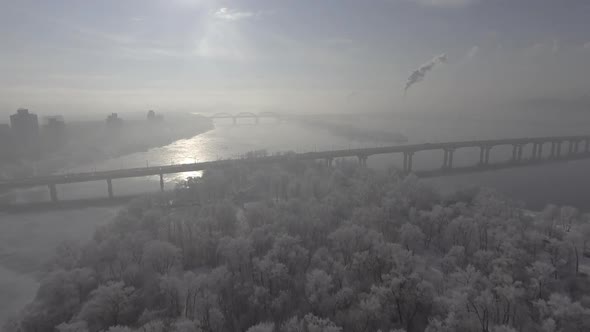 City in the Snow, Flying Over the Forest