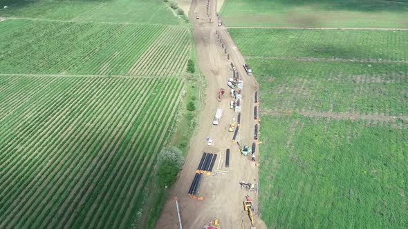 Aerial view of gas and oil pipeline construction. Pipes welded together