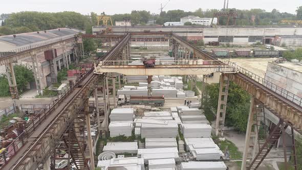 Aerial of overhead cranes at a precast plant