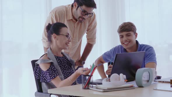 Group Meeting of Creative Business People Designer and Artist at Office Desk