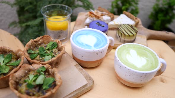 Having Breakfast With Matcha Green Tea Latte, Blue Matcha Latte And Vegan Food