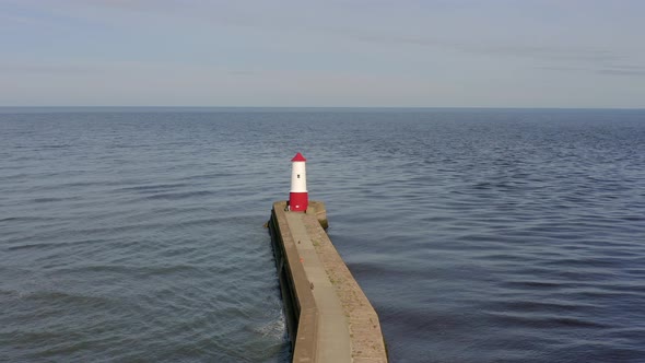 Berwick Breakwater and a Lighthouse in the Summer