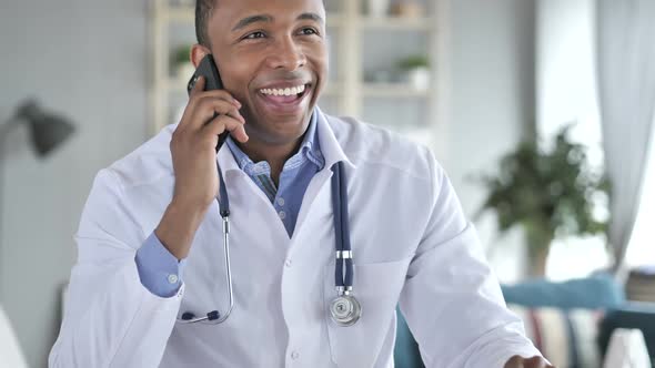 AfricanAmerican Doctor Talking on Phone