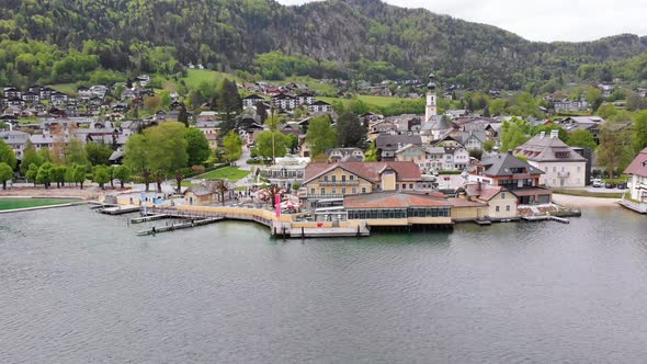 Aerial View of Mountain Lake Wolfgangsee with Houses of Resort Town in Austria, Alps