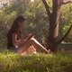 Young Woman In Park Uses Smartphone And Tablet - VideoHive Item for Sale