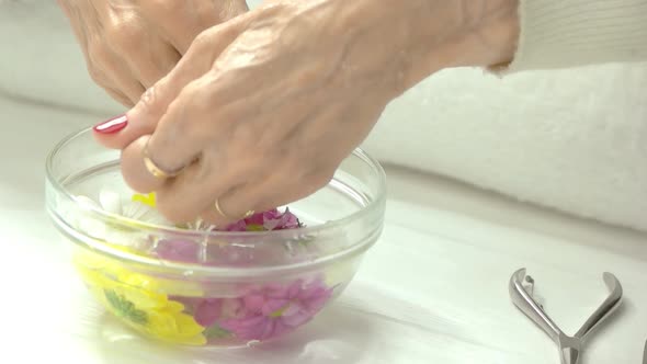 Well-groomed Hands Having Spa, Slow Motion.