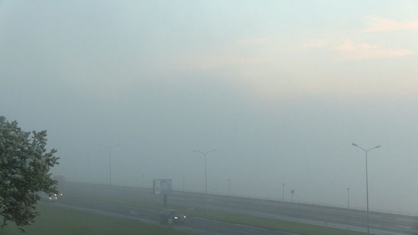 Fog Moving Over A Highway