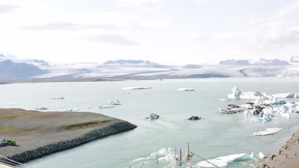 Aerial view of some melting ice rocks in the jokulsarlon lake in Iceland.