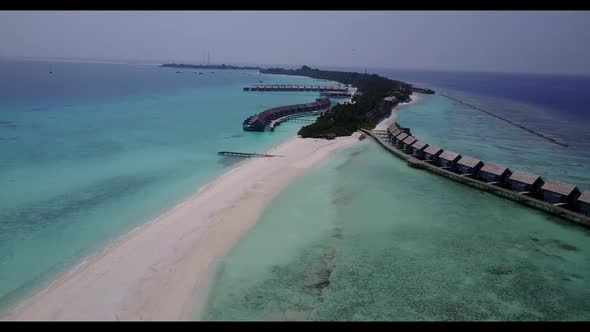 Aerial view seascape of perfect coast beach voyage by blue water and white sandy background of a pic