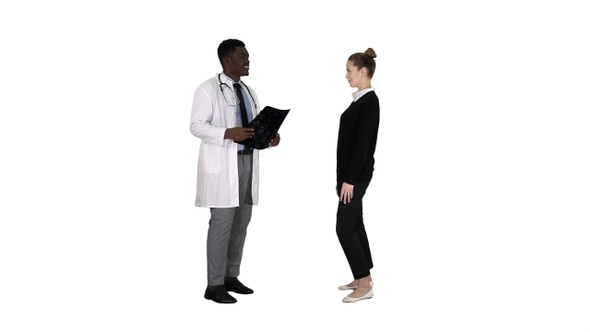 Physician showing a patient the X-ray results Then patient