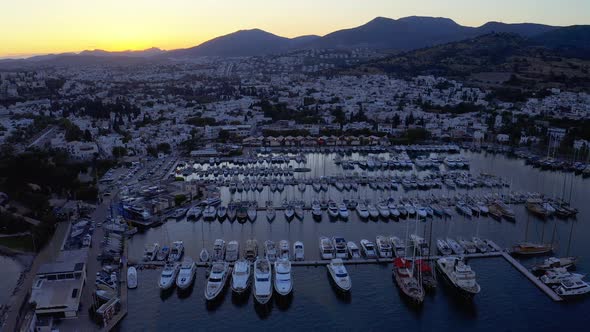 Aerial Footage of an Elite Yachts Moored in Port at the Sunset. Resort Town Bodrum, Turkey. Overall